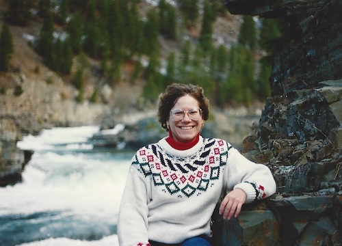 Lynn Smith with waterfalls in background