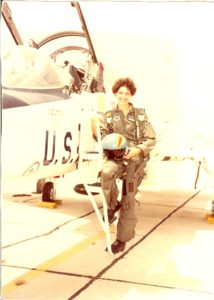 Debra Terry beside aircraft