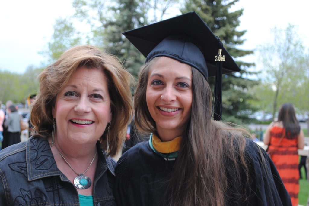Kathy Bauer and her daughter Emily pose at Emily's CSU graduation ceremony. 