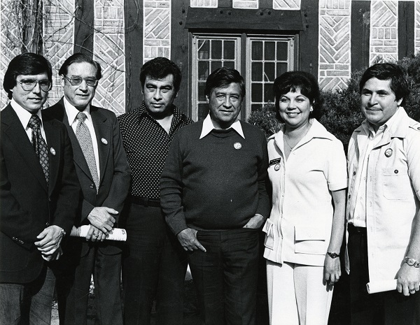 Polly Baca with Cesar Chavez and legislators