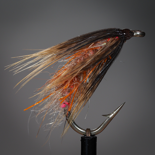 Example of how hackle from a chicken is used as fly fishing bait