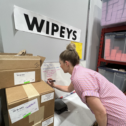 Kaitlin Moss checks Wipeys inventory