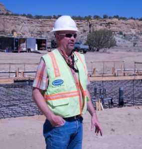 Patrick Page on a construction site for the Navajo-Gallup Water Supply Project in 2018.