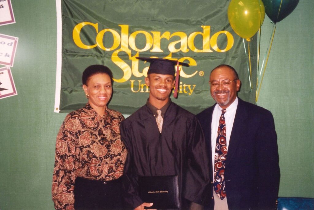 Ronald Antoine and his parents at his graduation. 